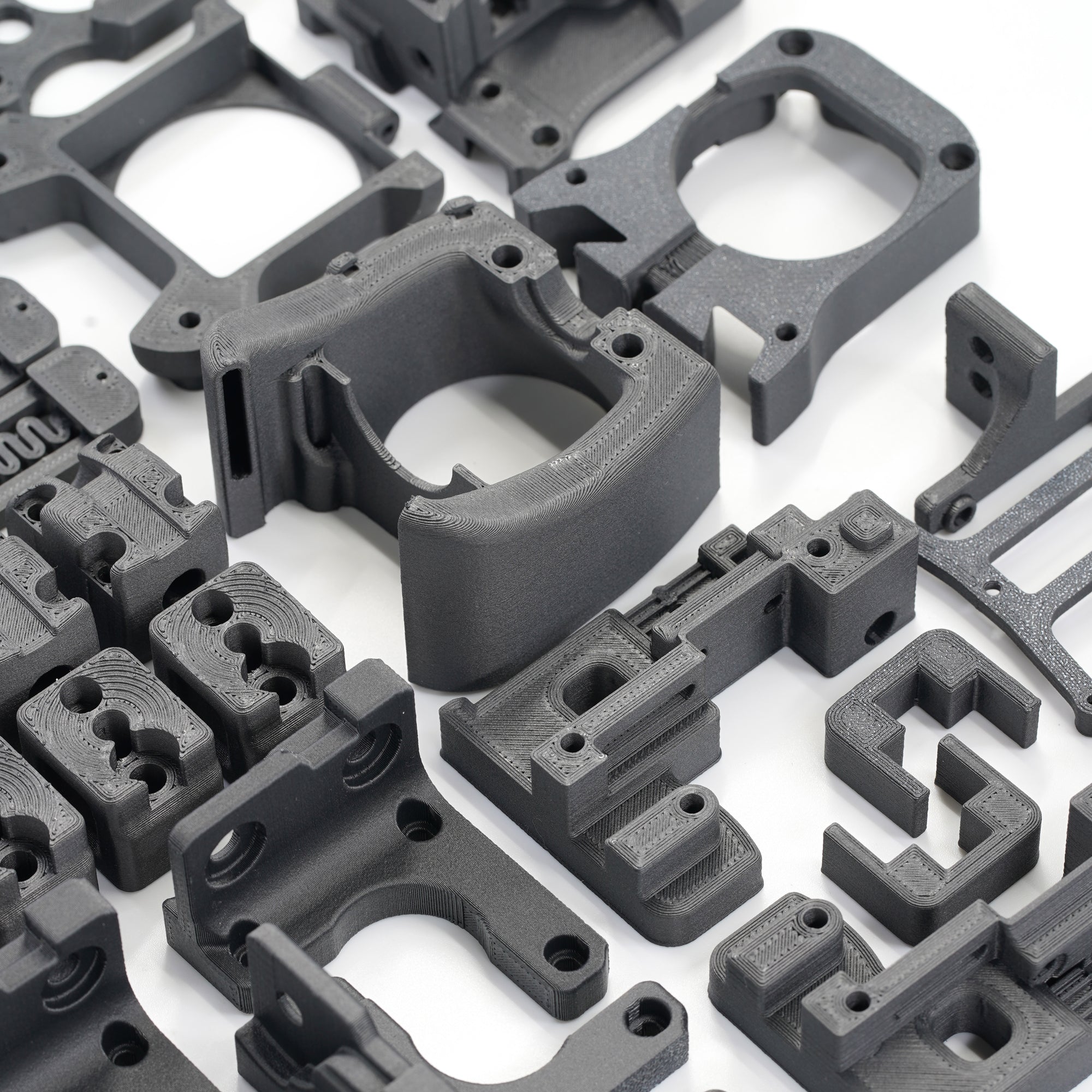 Voron 2.4 R1 Functional Parts Set Printed in Prusament Polycarbonate Carbon Fibre with Fire Engine Red Accents